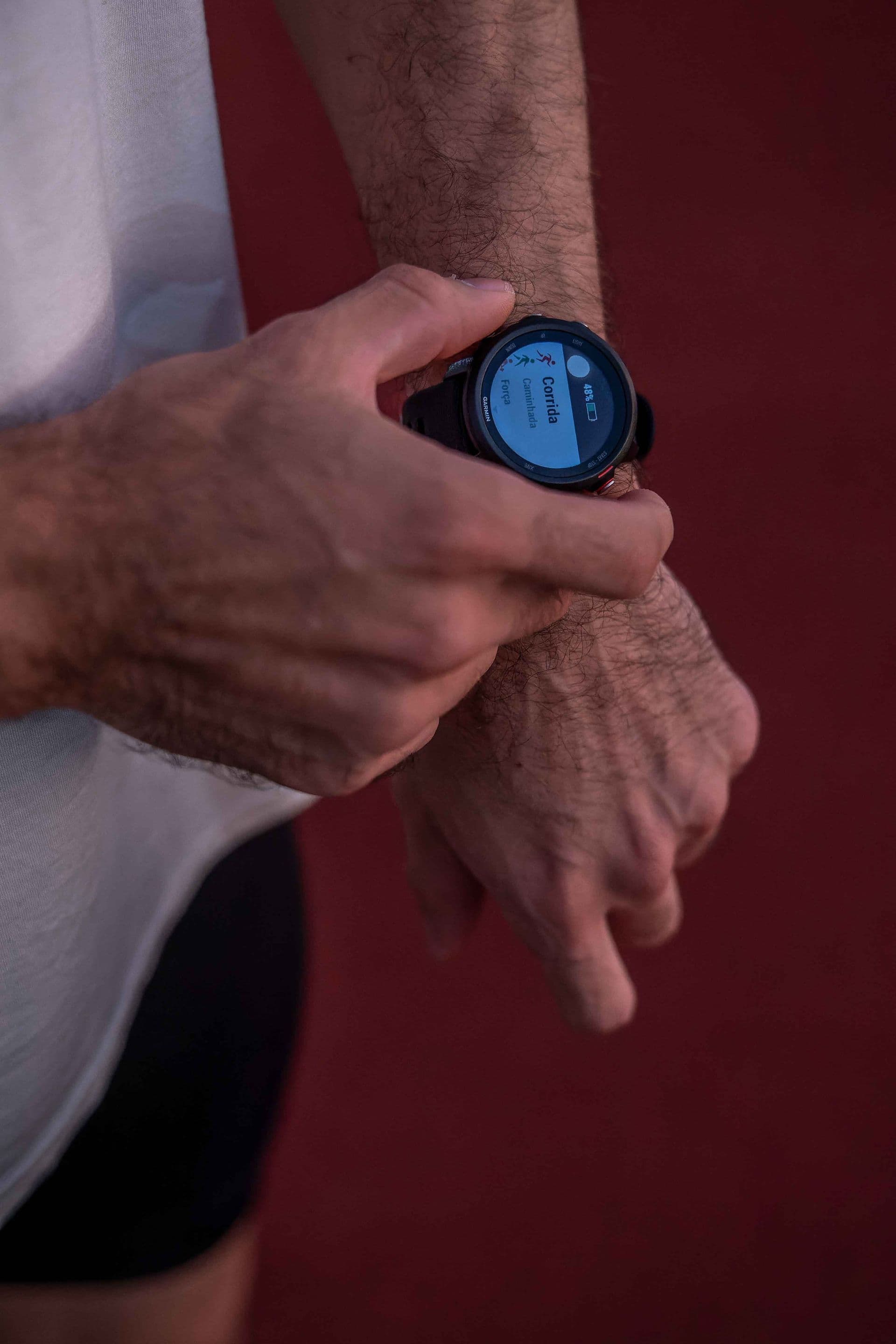 Runner starting a run on a Garmin watch